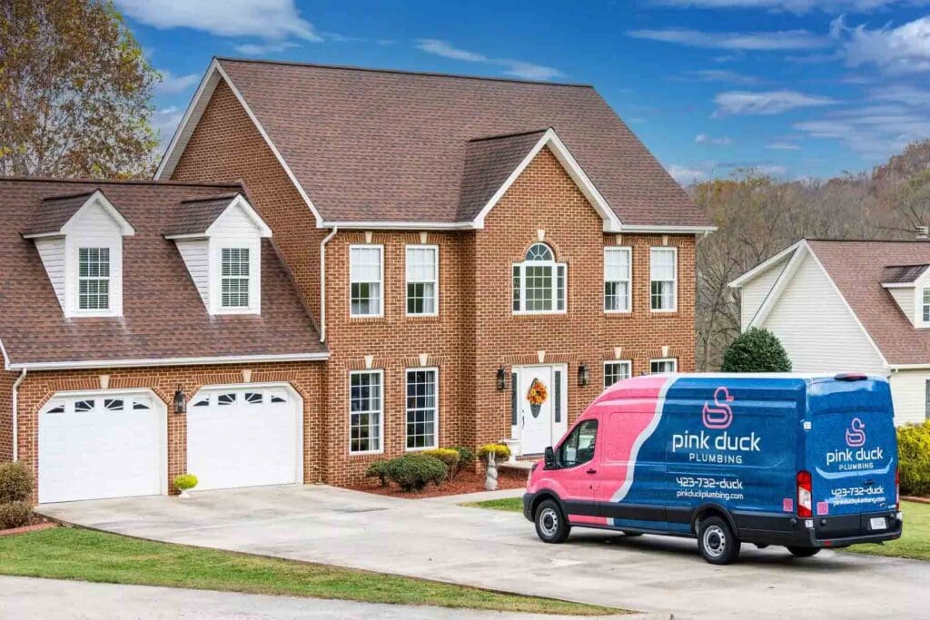 Plumbing Truck Outside House